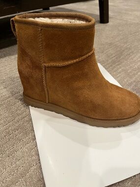 Ugg suede wedge boots.